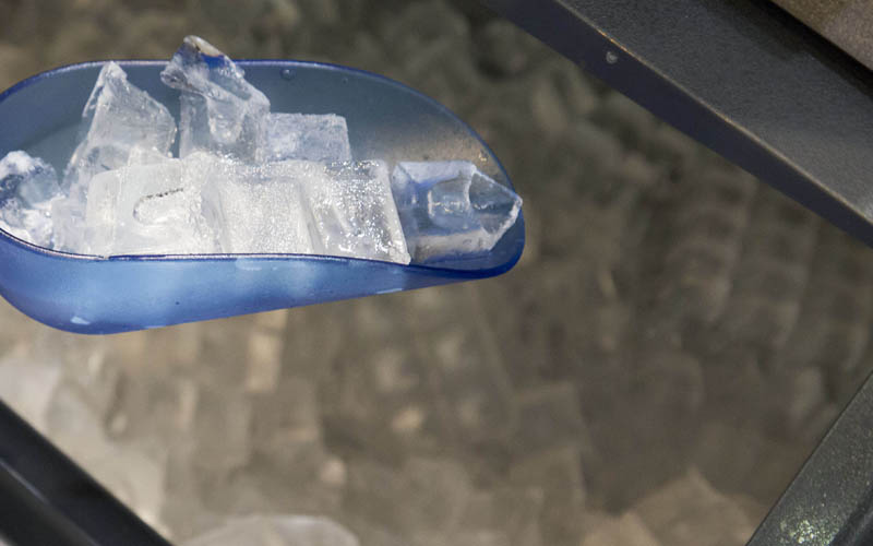 Unsanitary ice scoop can contaminate ice in the bin!